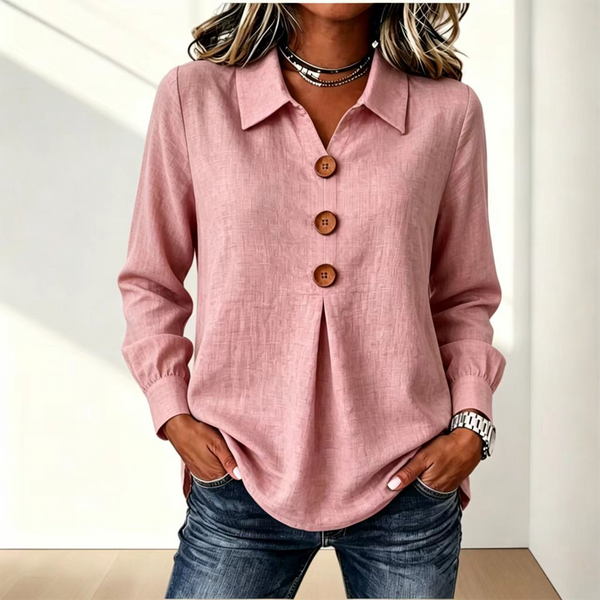 Blusa de mujer con cuello clásico y botones decorativos