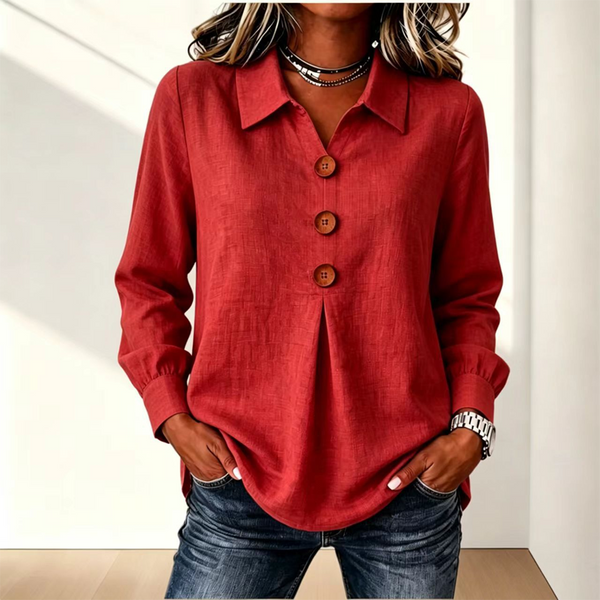 Blusa de mujer con cuello clásico y botones decorativos