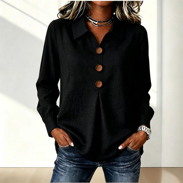 Blusa de mujer con cuello clásico y botones decorativos