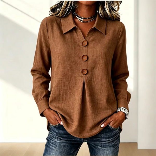 Blusa de mujer con cuello clásico y botones decorativos