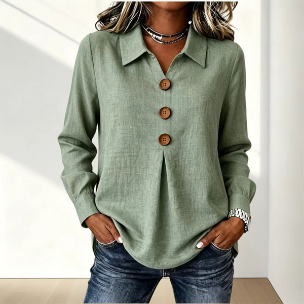 Blusa de mujer con cuello clásico y botones decorativos