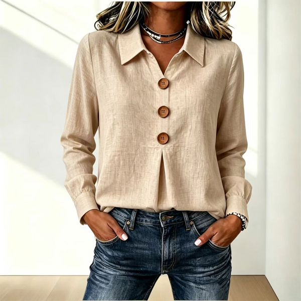 Blusa de mujer con cuello clásico y botones decorativos