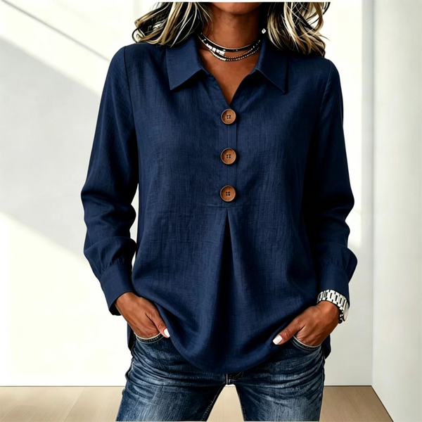 Blusa de mujer con cuello clásico y botones decorativos