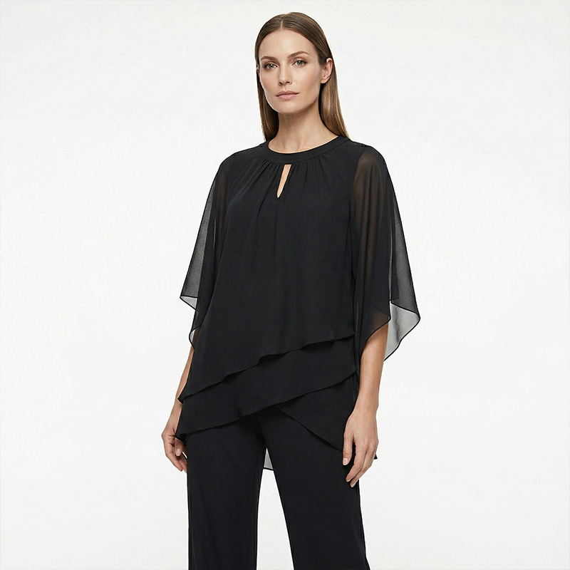 Conjunto elegante mujer con blusa asimétrica y pantalón ancho