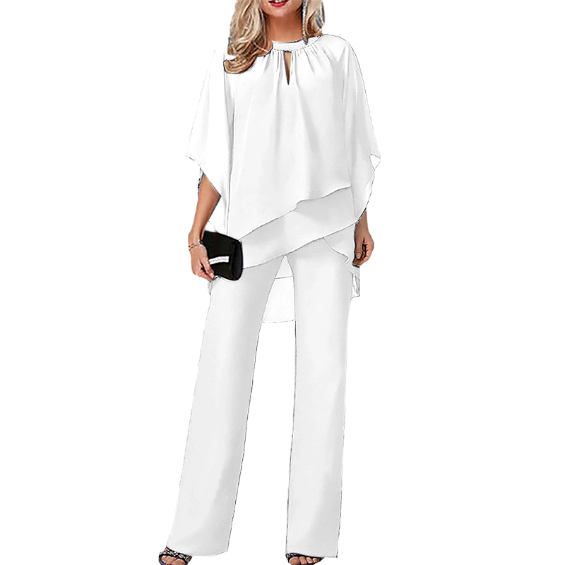 Conjunto elegante mujer con blusa asimétrica y pantalón ancho