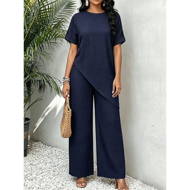 Conjunto de mujer con top asimétrico y pantalón de pernera ancha