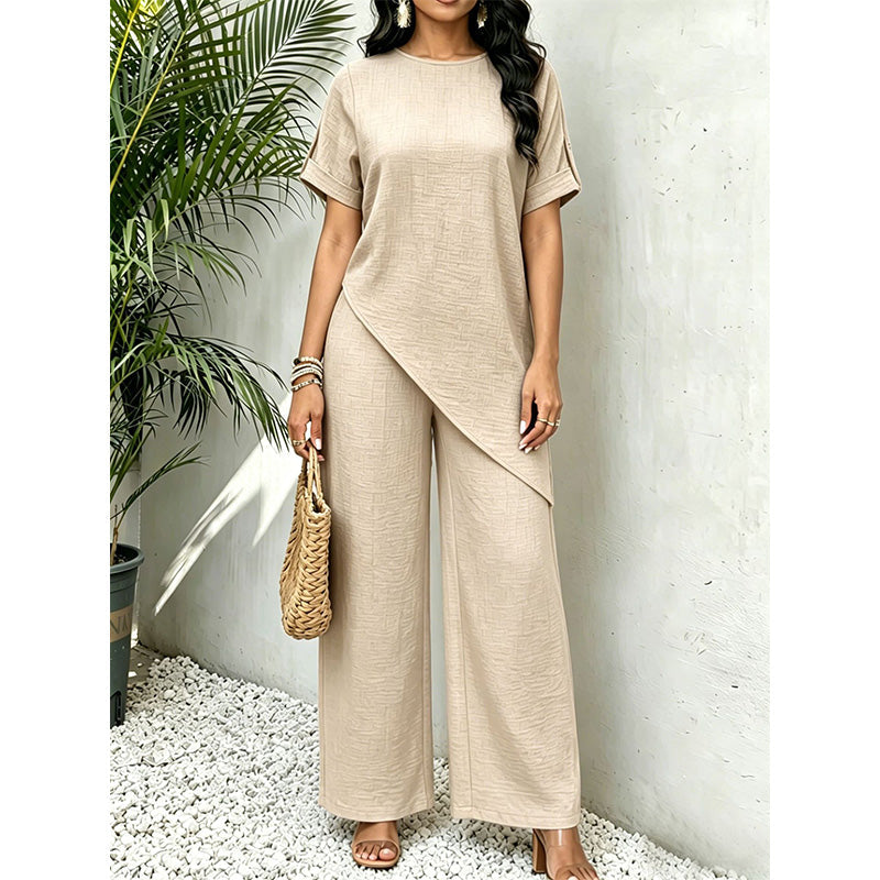 Conjunto de mujer con top asimétrico y pantalón de pernera ancha